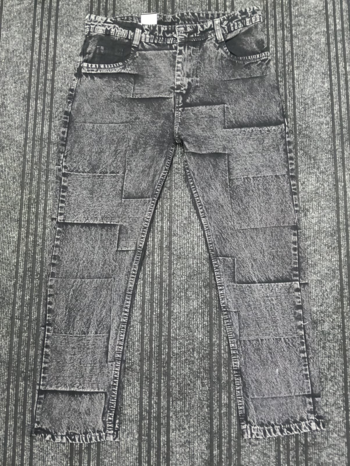 Rai-ox acid-wash patchwork jeans, flat lay